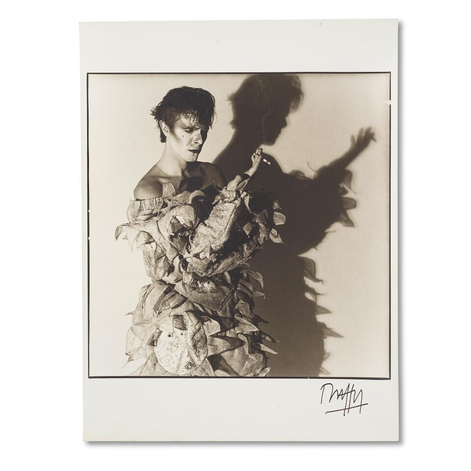 Brian Duffy (1933-2010): A sepia/bromide print from Scary Monsters (and Super Creeps), 1980,: Brian Duffy (1933-2010): A sepia/bromide print from Scary Monsters (and Super Creeps), 1980, printed by Chris Duffy and signed by Duffy in black ink to lower right corner, with code to reverse, 16 x 1