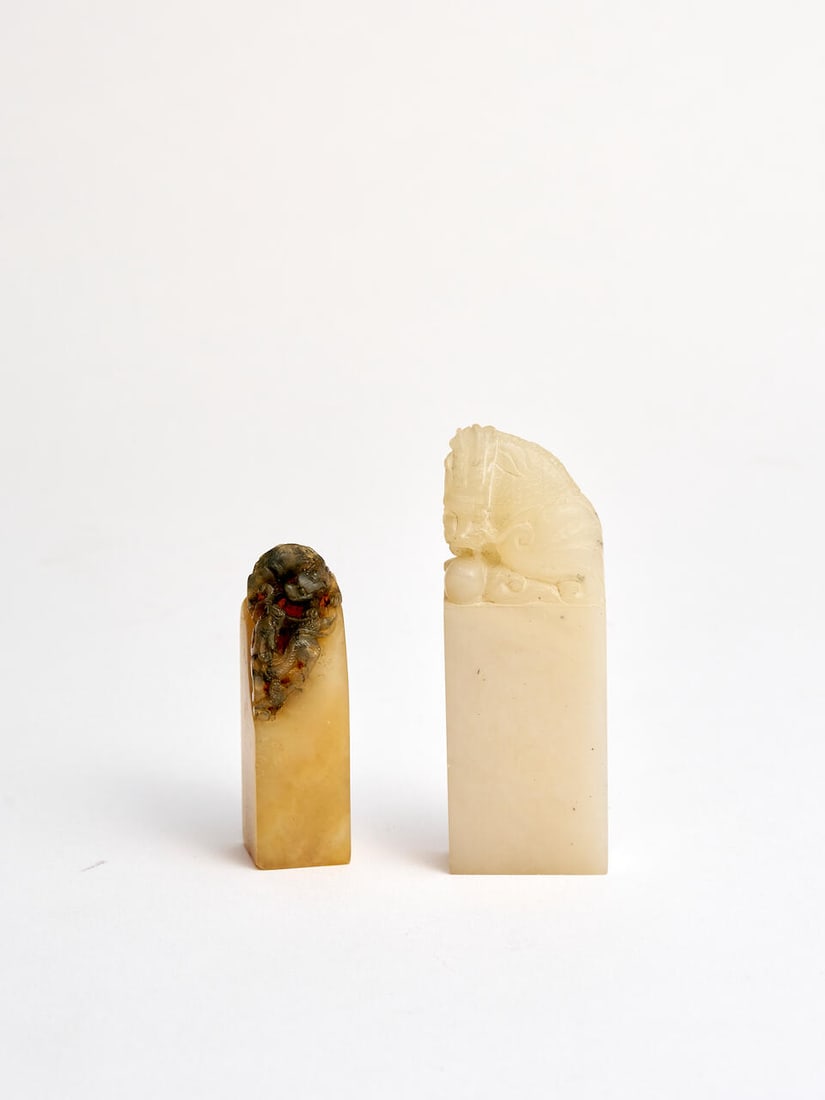 Two soapstone 'dragon' seals 20th century (2): Two soapstone 'dragon' seals 20th century with two boxes, 5.3cm high; 7.5cm high (2). Footnotes: 二十世紀 壽山石龍紋料二枚 