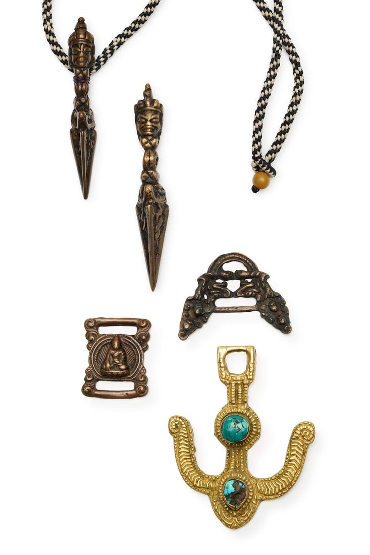 Two copper alloy thogchags, two phurbu, and a milkpail hook with turquoise inlays Tibet, date un... (1 of 2)