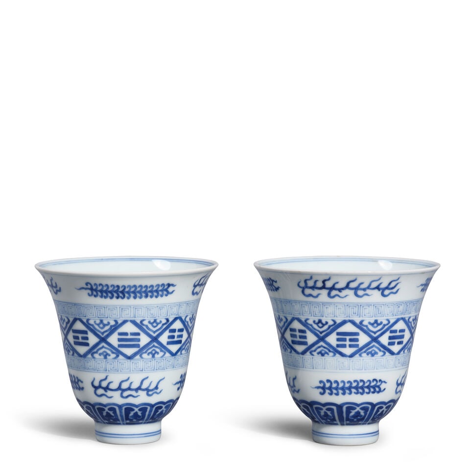 A PAIR OF BLUE AND WHITE 'TRIGRAM' BELL-SHAPED CUPS (2, box for each)