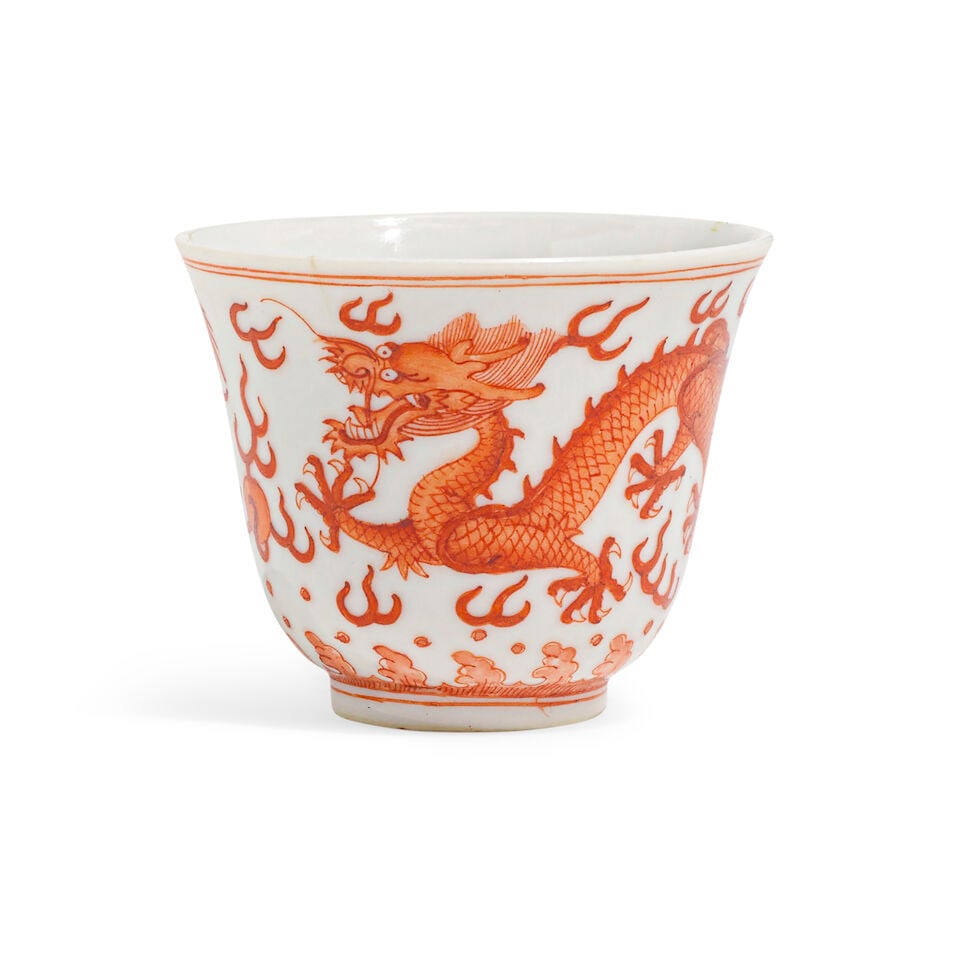AN IRON-RED 'DRAGON' WINE CUP Guangxu mark and of the period (wood stand)