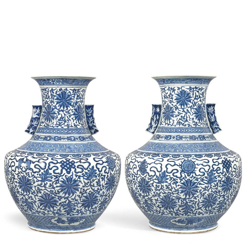 A PAIR OF MASSIVE BLUE AND WHITE 'LOTUS AND BAJIXIANG' VASES Late Qing dynasty/Republic period (2)