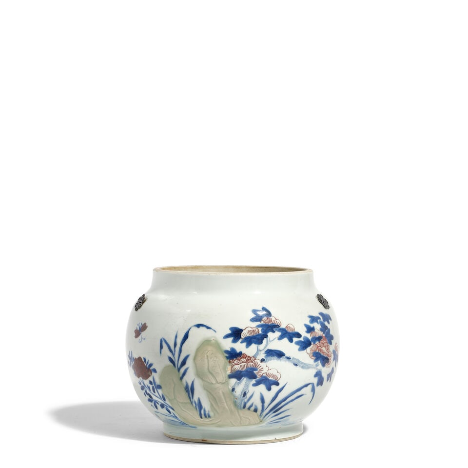 AN UNDERGLAZE-BLUE, COPPER-RED AND CELADON DECORATED GLOBULAR JAR Kangxi period (fitted wood cover)