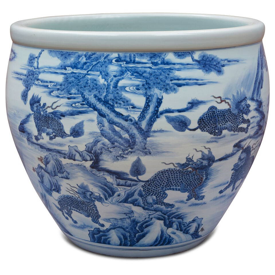 AN UNDERGLAZE-BLUE COPPER-RED 'MYTHICAL BEAST' JARDINIÈRE