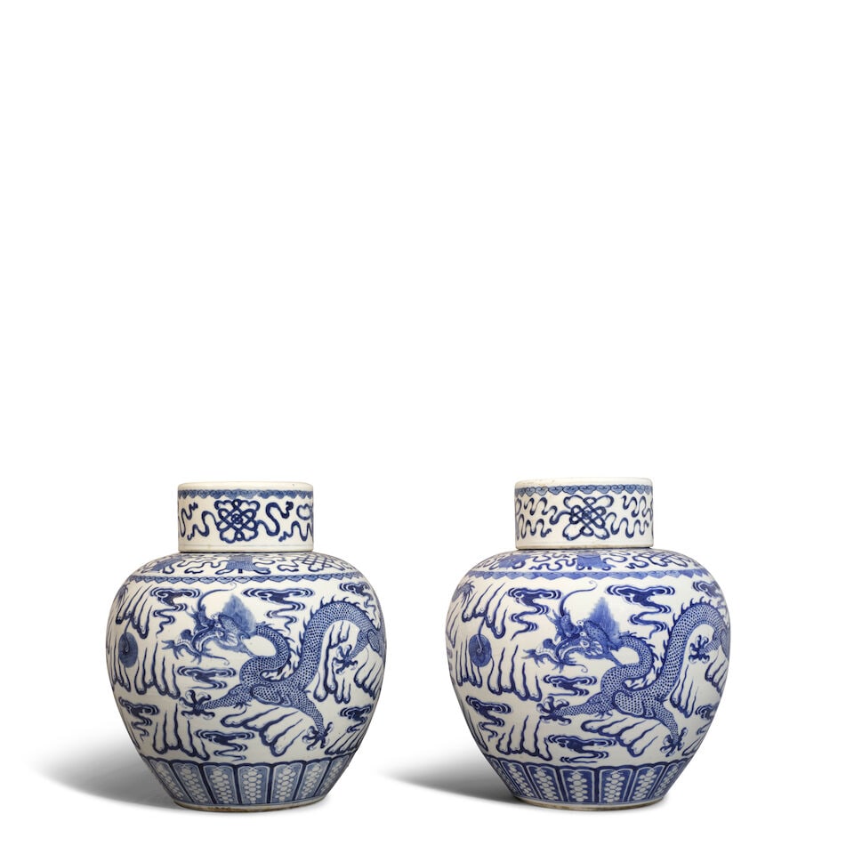A PAIR OF BLUE AND WHITE 'DRAGON' GINGER JARS AND COVERS Kangxi marks, Late Qing dynasty/Republi...
