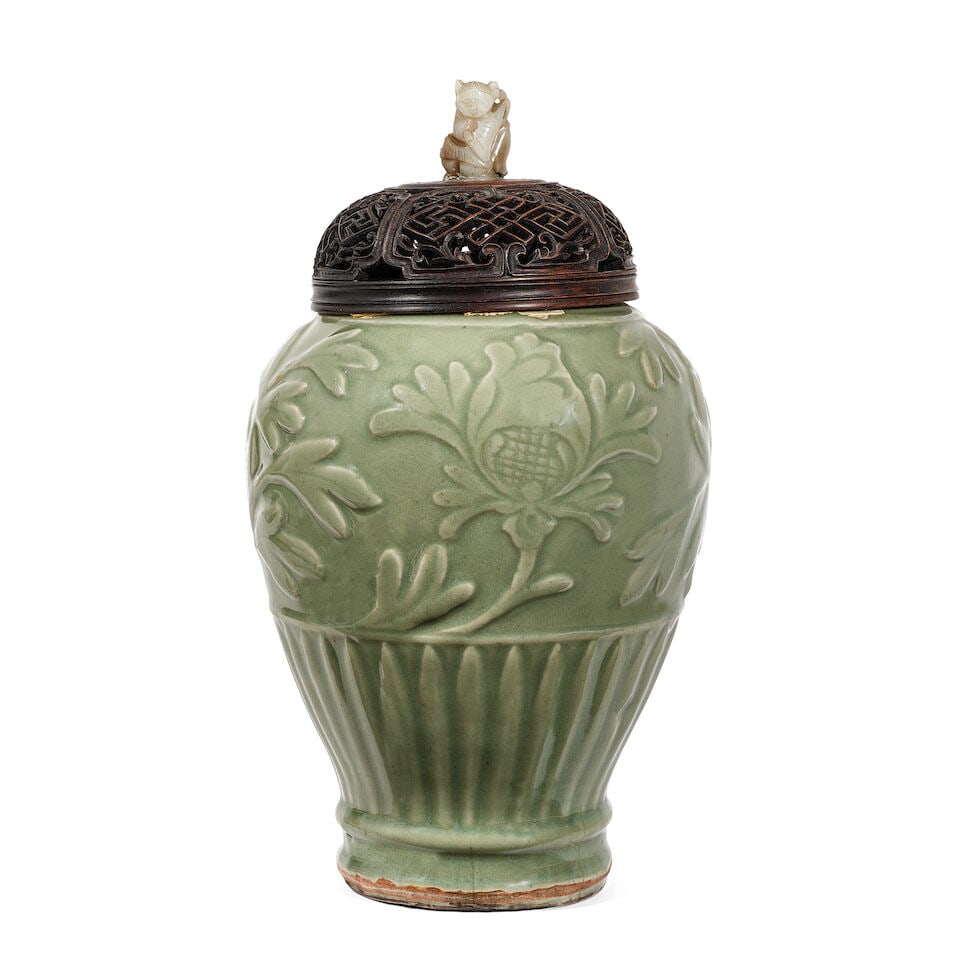A 'LONGQUAN' CELADON-GLAZED 'FLORAL' VASE, REDUCED Ming dynasty (wood cover and stand)