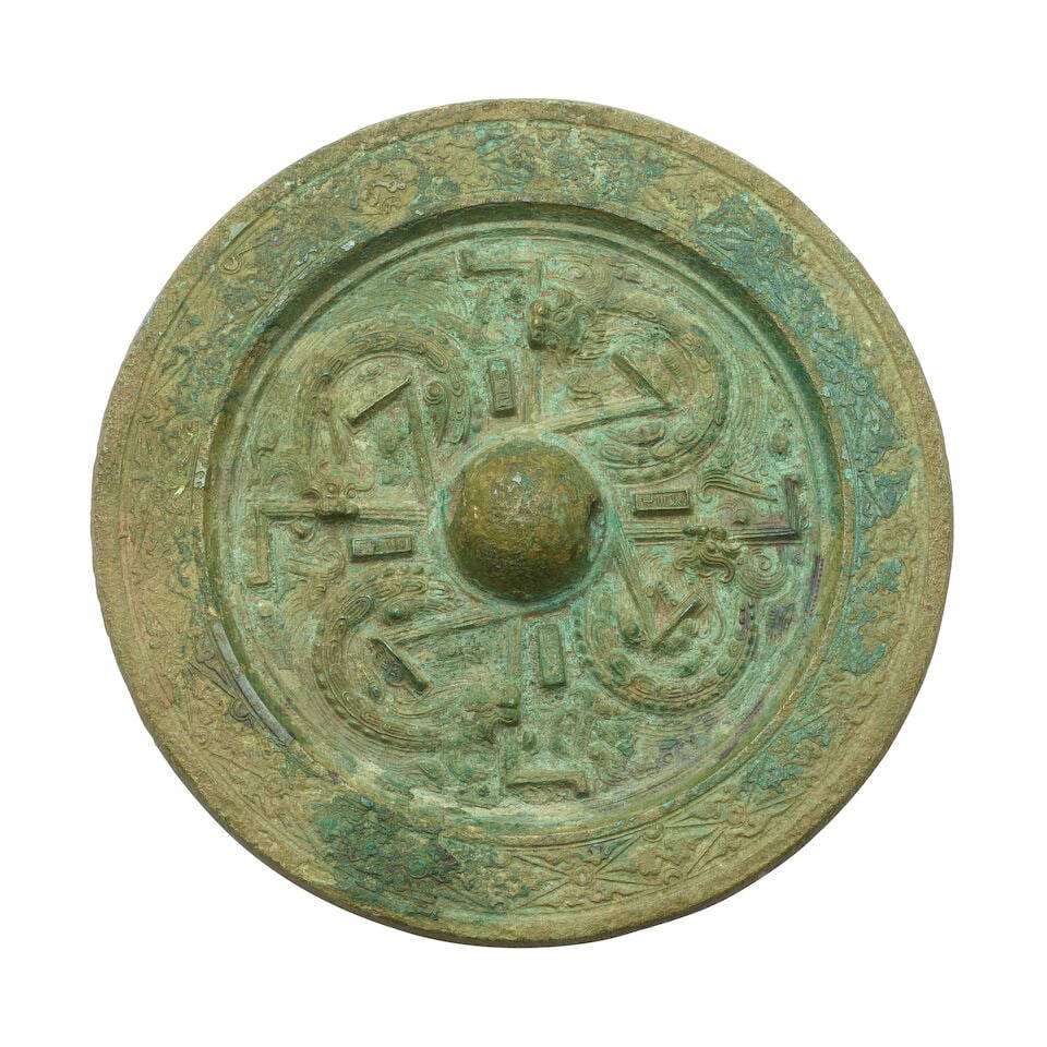 A BRONZE CIRCULAR MIRROR Eastern Han dynasty (wood box)