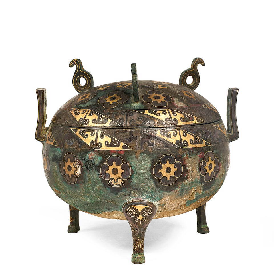 A GOLD-AND-SILVER-INLAID BRONZE TRIPOD VESSEL AND COVER, DING Han-style