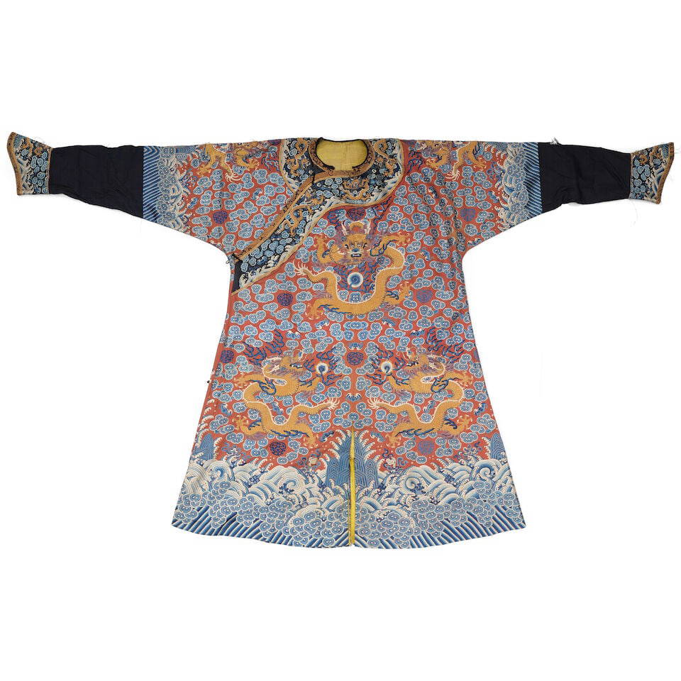 AN APRICOT-GROUND EMBROIDERED SILK 'DRAGON' ROBE, LONGPAO 19th century