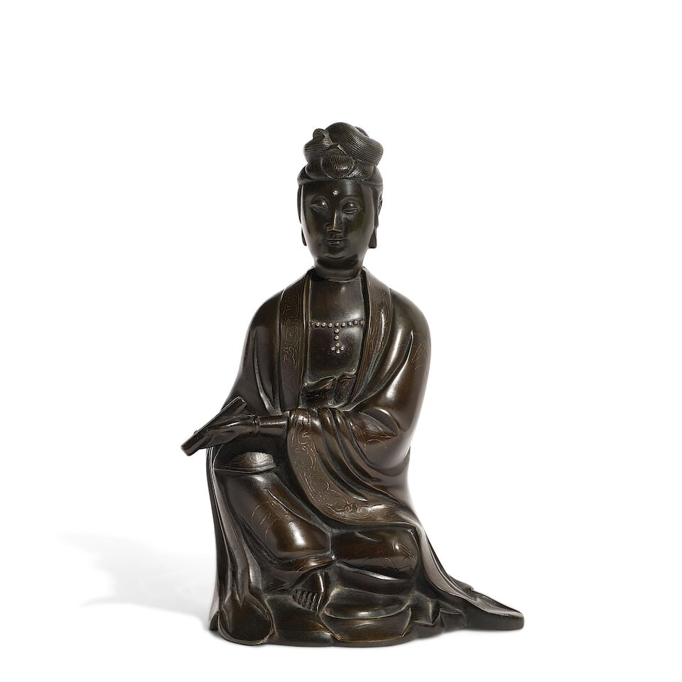 A SILVER-INLAID BRONZE FIGURE OF GUANYIN 19th century