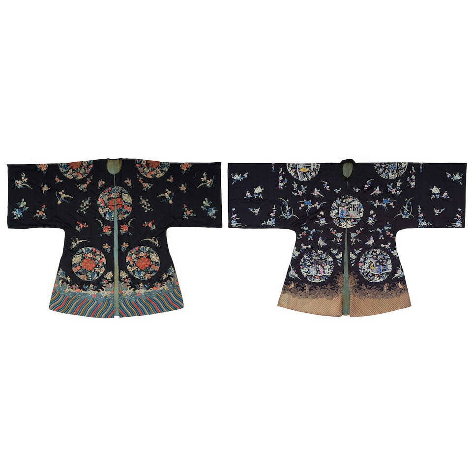 TWO EMBROIDERED DARK-BLUE-GROUND INFORMAL LADY'S SILK ROBES Late Qing dynasty (2)