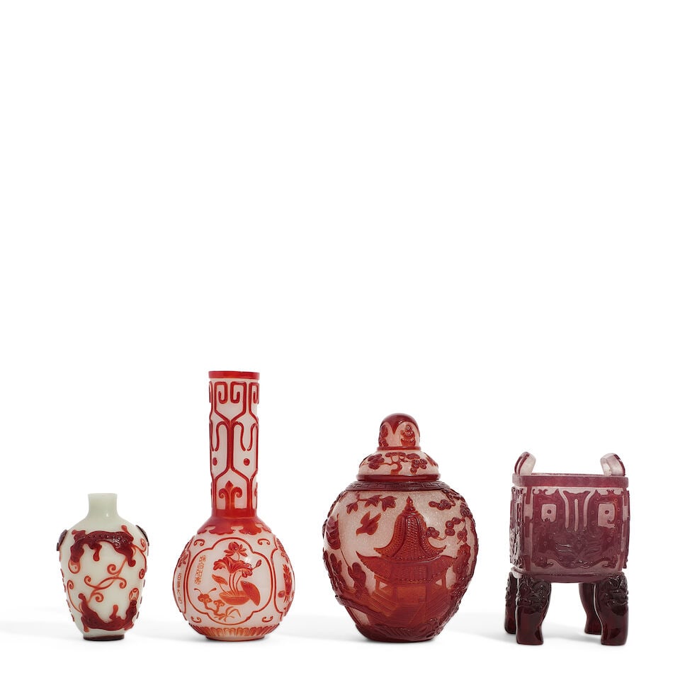 A GROUP OF FOUR RED OVERLAY PEKING GLASS VESSELS 20th century (4, wood stands for the ding and l...