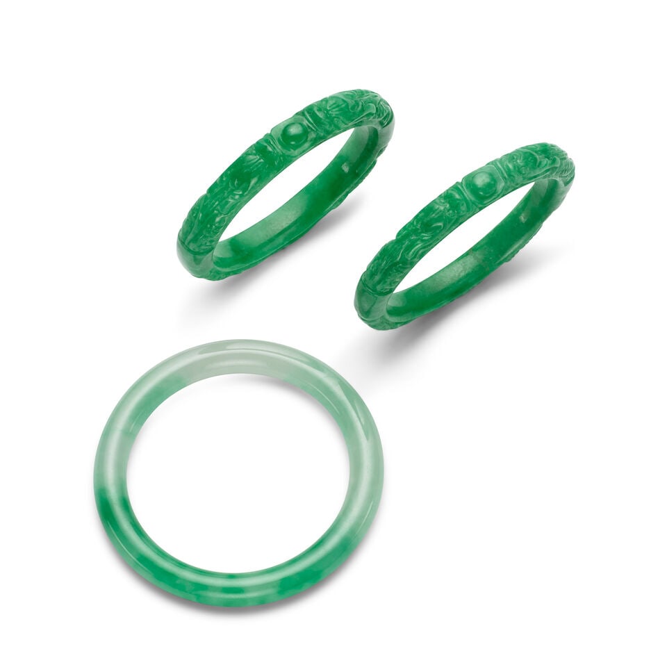 A GROUP OF THREE JADEITE BANGLES 20th century (3, cloth pouch and leather case) (1 of 1)