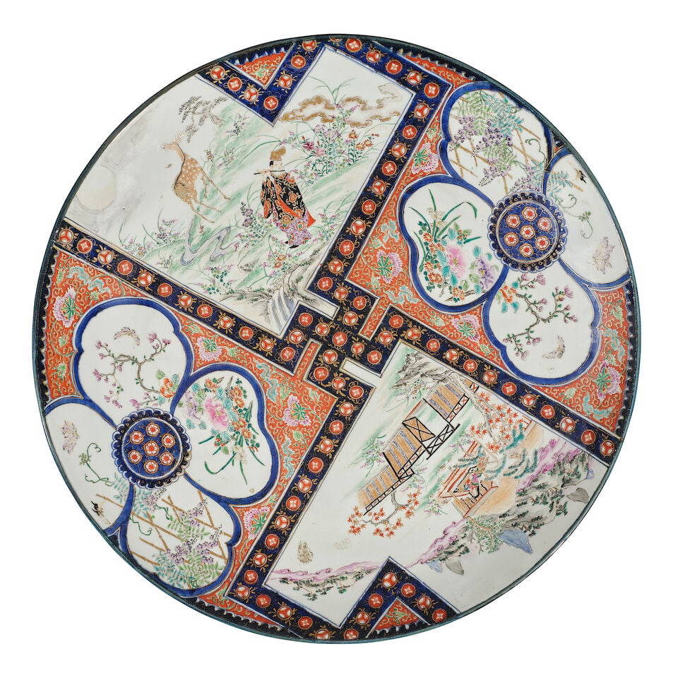 A MASSIVE JAPANESE GILT AND OVERGLAZE ENAMEL DECORATED ARITA PORCELAIN CHARGER Meiji era (1868-1...