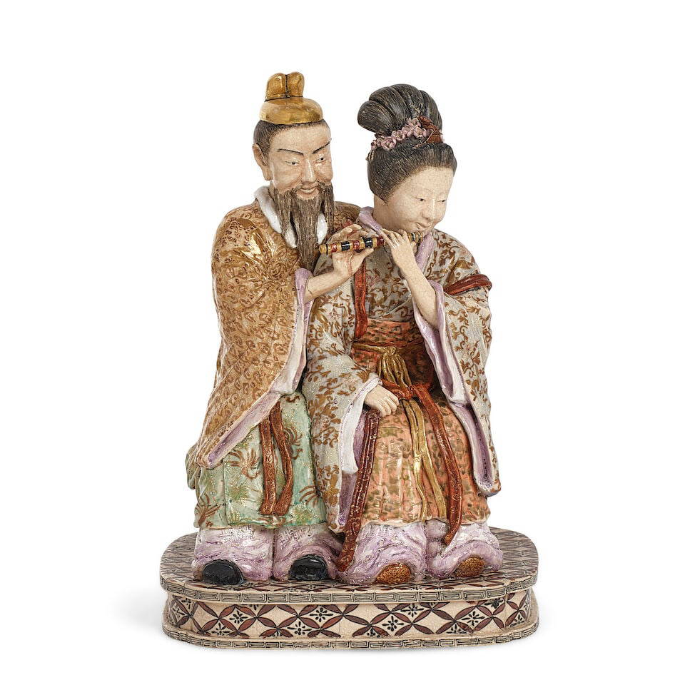 A JAPANESE GILT POLYCHROME FIGURE OF A CHINESE MAN AND WOMAN PLAYING A FLUTE 20th century
