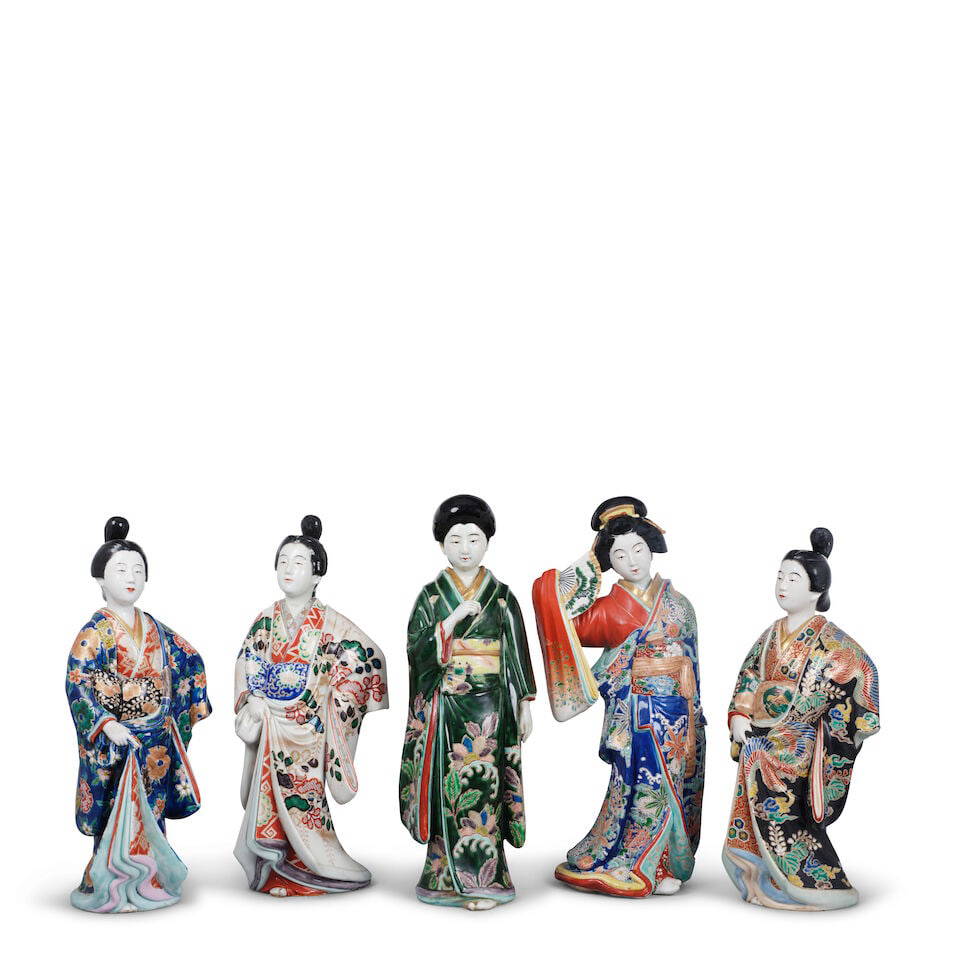 A GROUP OF FIVE JAPANESE GILT AND OVERGLAZE ENAMEL DECORATED KUTANI PORCELAIN FIGURES OF STANDIN...