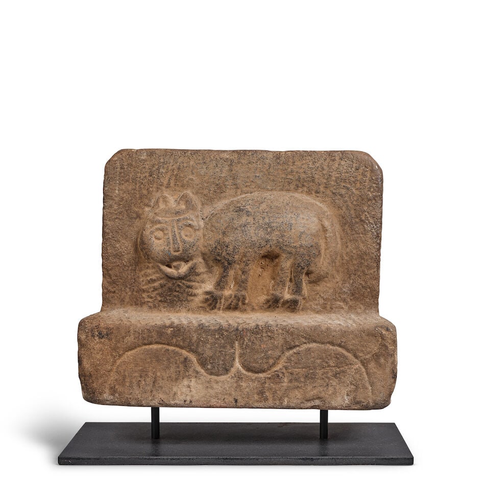 A KOREAN STONE STELE OF A TIGER 19th/20th century (with later stand): A KOREAN STONE STELE OF A TIGER 19th/20th century 11 x 13 1/4 x 5in (27.9 x 33.7 x 12.7cm) stele only (with later stand). Footnotes: Provenance: Collection of Robert and Alice Piccus, acquired in Hong