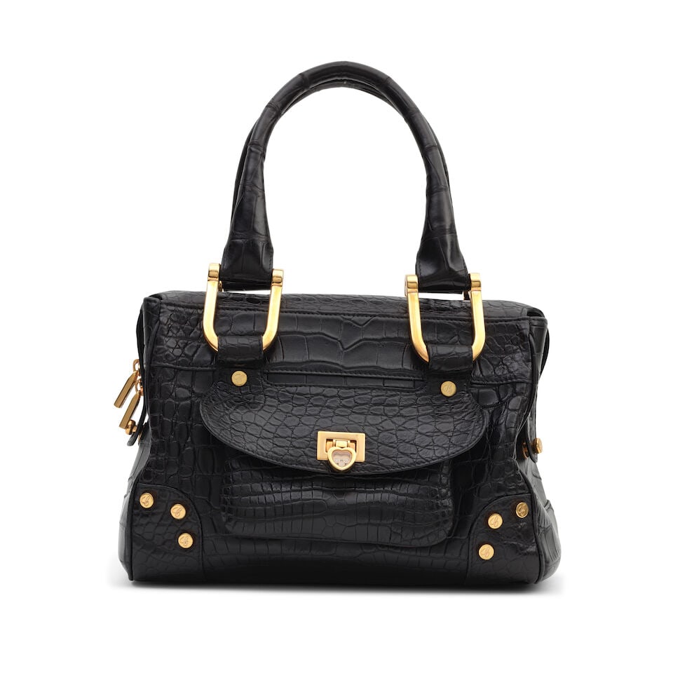 Chopard: a Matte Black Alligator Caroline Bowler Bag 2010s, Limited Edition 14/17 (includes card): Chopard: a Matte Black Alligator Caroline Bowler Bag 2010s, Limited Edition 14/17 Features 'Happy Diamond' heart shaped lock with floating diamonds, and gold-tone hardware Condition Grade B- 27cm, 18c