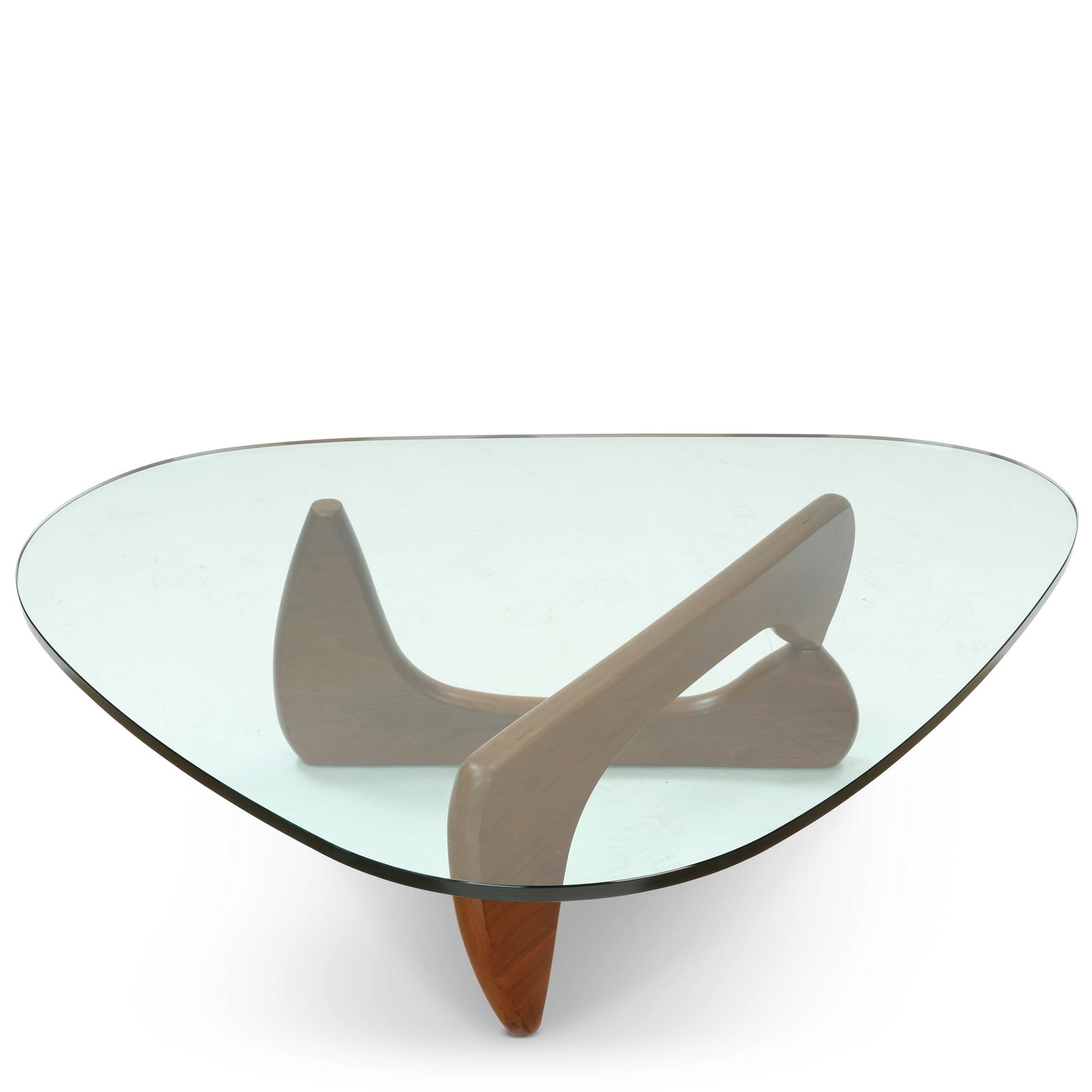 ISAMU NOGUCHI (1904-1988) IN-50 Coffee Tablefor Herman Miller, walnut, glass, glass etched 'Isam...: ISAMU NOGUCHI (1904-1988) IN-50 Coffee Table for Herman Miller, walnut, glass, glass etched 'Isamu Noguchi' and base with black metal Herman Miller tag on underside height 15 3/4in (40cm); width 50in