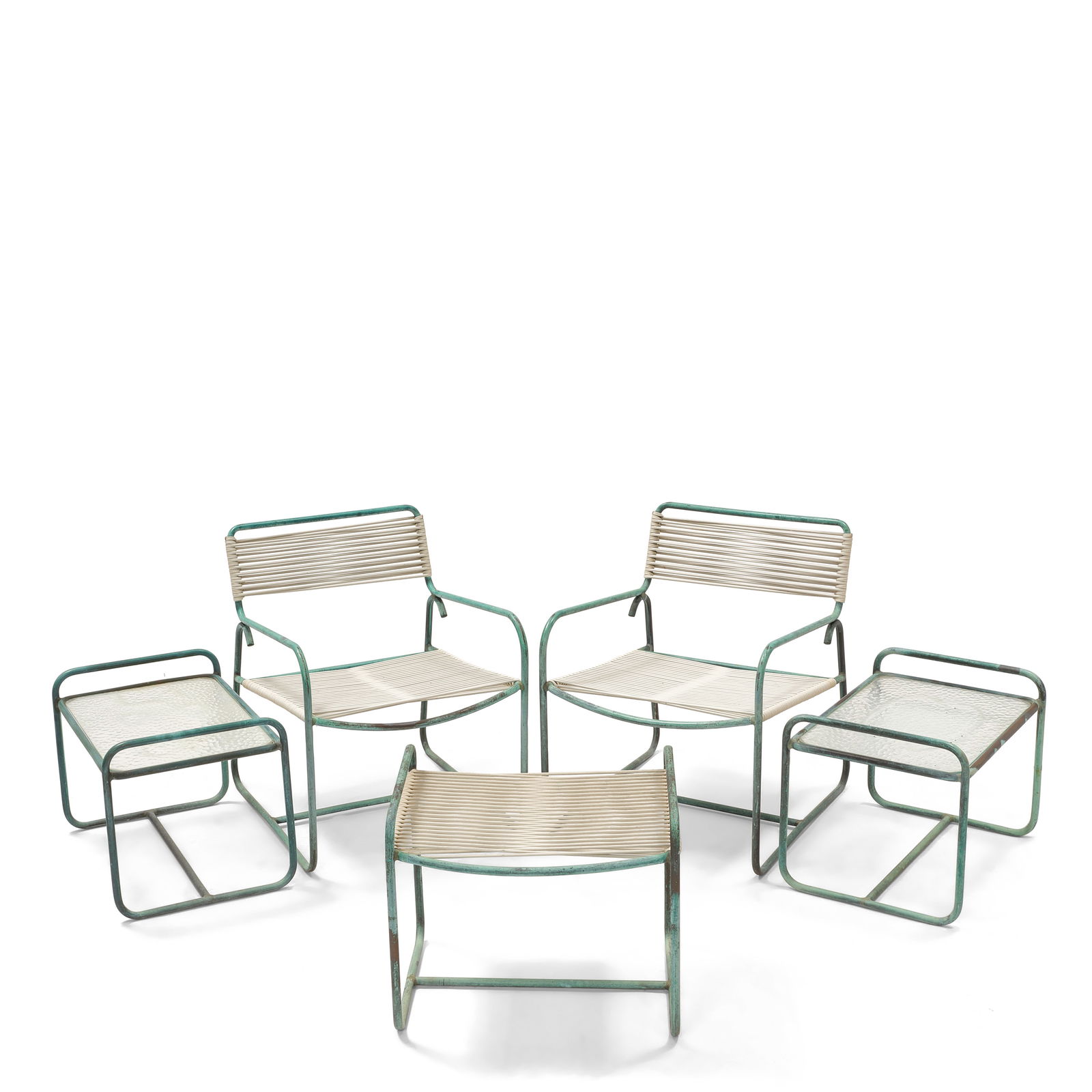 WALTER LAMB (ACTIVE 1950S) Two Lounge Chairs, Two Side Tables, One Ottomancirca 1955for Brown Jo...: WALTER LAMB (ACTIVE 1950S) Two Lounge Chairs, Two Side Tables, One Ottoman circa 1955 for Brown Jordan, bronze tubing, rubber cord, glass height of each lounge chair 29 3/4in (75.5cm); width 23 1/4in
