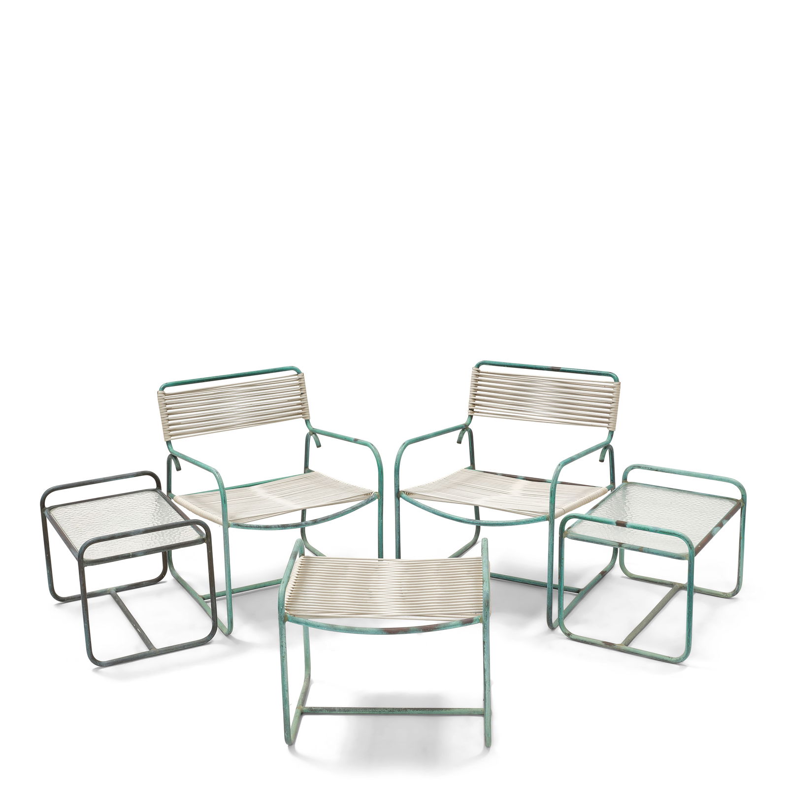WALTER LAMB (ACTIVE 1950S) Two Lounge Chairs, Two Low Occasional Tables, One Ottomancirca 1955fo...: WALTER LAMB (ACTIVE 1950S) Two Lounge Chairs, Two Low Occasional Tables, One Ottoman circa 1955 for Brown Jordan, bronze tubing, rubber cord, glass height of each lounge chair 29 3/4in (75.5cm); width