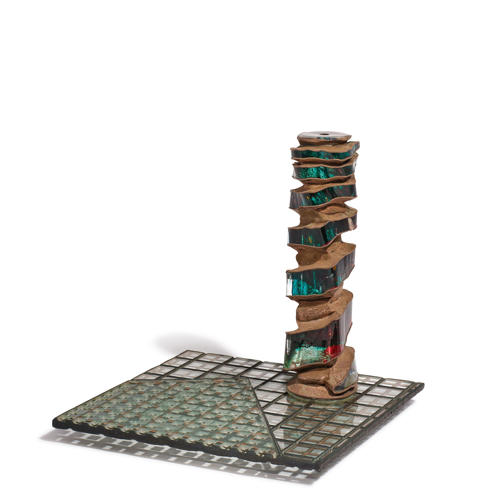 MICHAEL GLANCY (1950-2020) Silver Spires Squared #121981cast, cut and plate glass, with electro...: MICHAEL GLANCY (1950-2020) Silver Spires Squared #12 1981 cast, cut and plate glass, with electro-formed copper exterior, etched 'MICHAEL M GLANCY 1981' along edge of base height 8 1/2in (21.6cm); wid