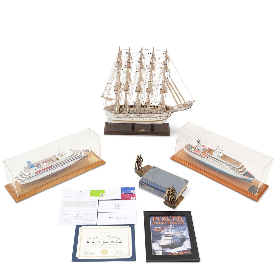 A GROUP OF SHIP MODELS AND MARINE THEMED MATERIALS 20th century: A GROUP OF SHIP MODELS AND MARINE THEMED MATERIALS 20th century Comprising one Clipper Francis model, one 1:200 scale Sea Goddess model in a plexiglass and wood case, one 1:256 scale Seabourn Spirit m
