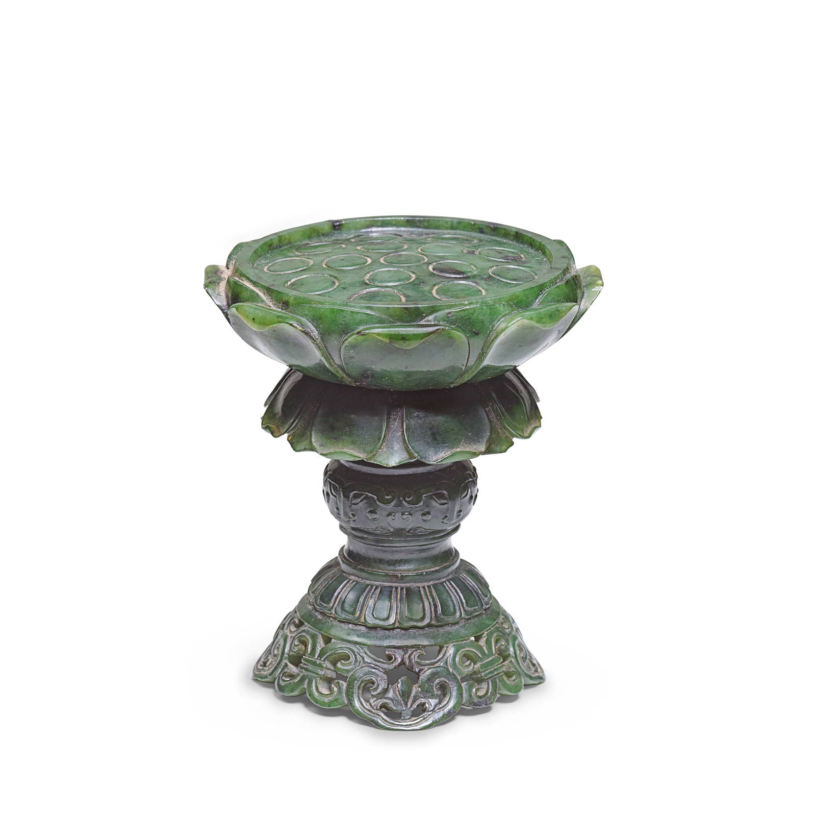 A CARVED SPINACH JADE 'LOTUS' STAND 18th/19th century (3)