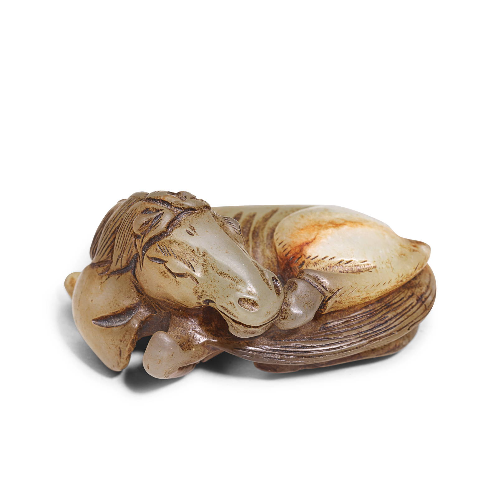 A PALE GREEN AND RUSSET 'HORSE' CARVING Late Qing Dynasty