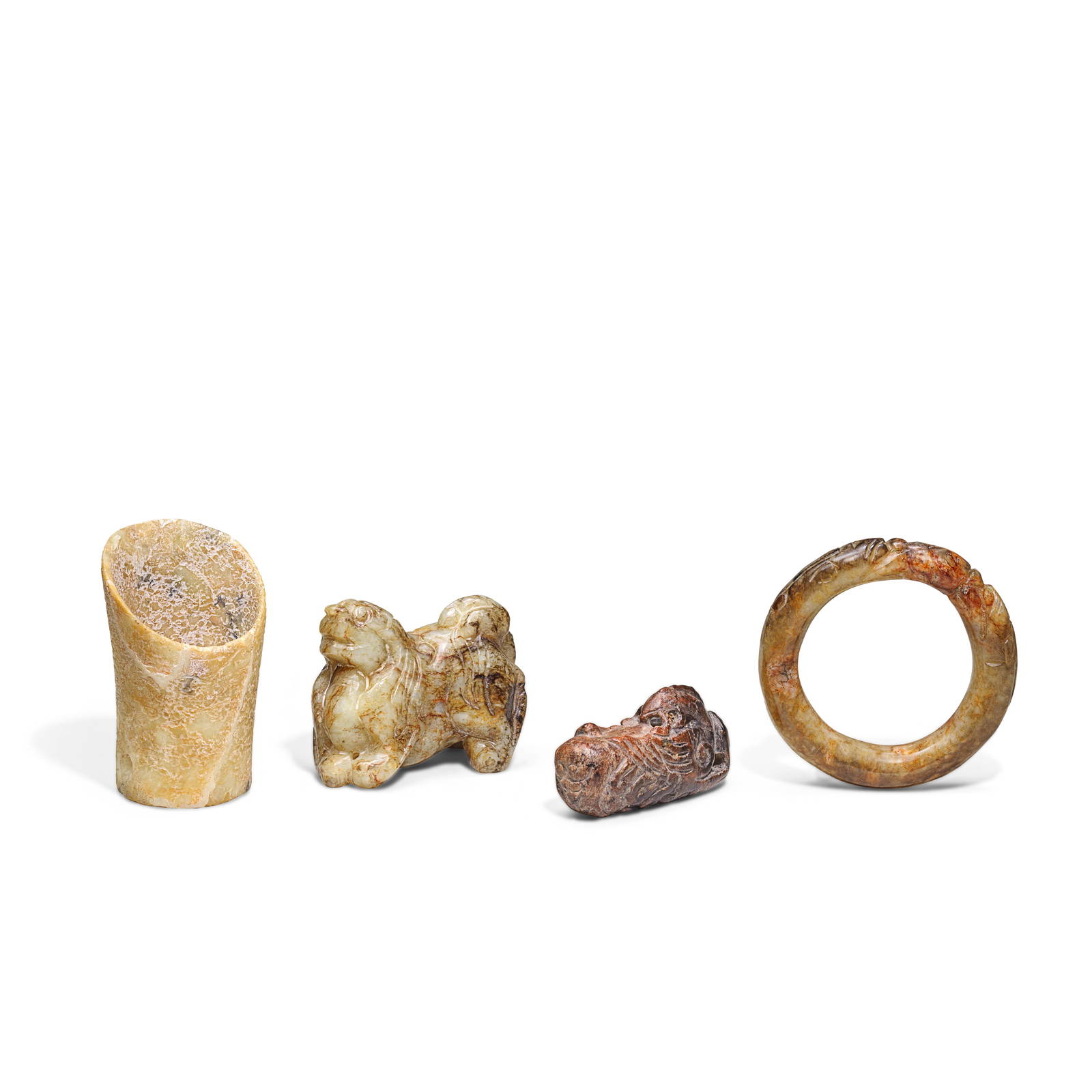 FOUR ARCHAISTIC JADE CARVINGS 19th/20th century (4)