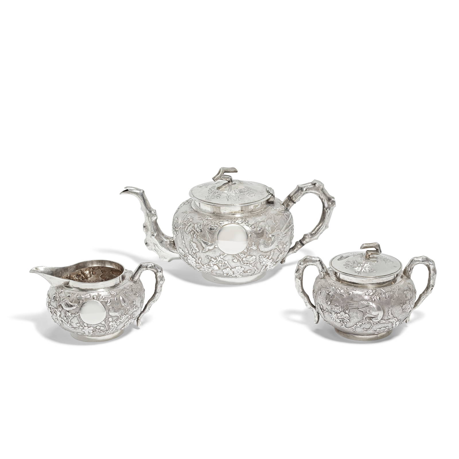 A CHINESE EXPORT SILVER TEA SERVICE Stamped WA, Hou Ji and 85, circa 1900 (4)