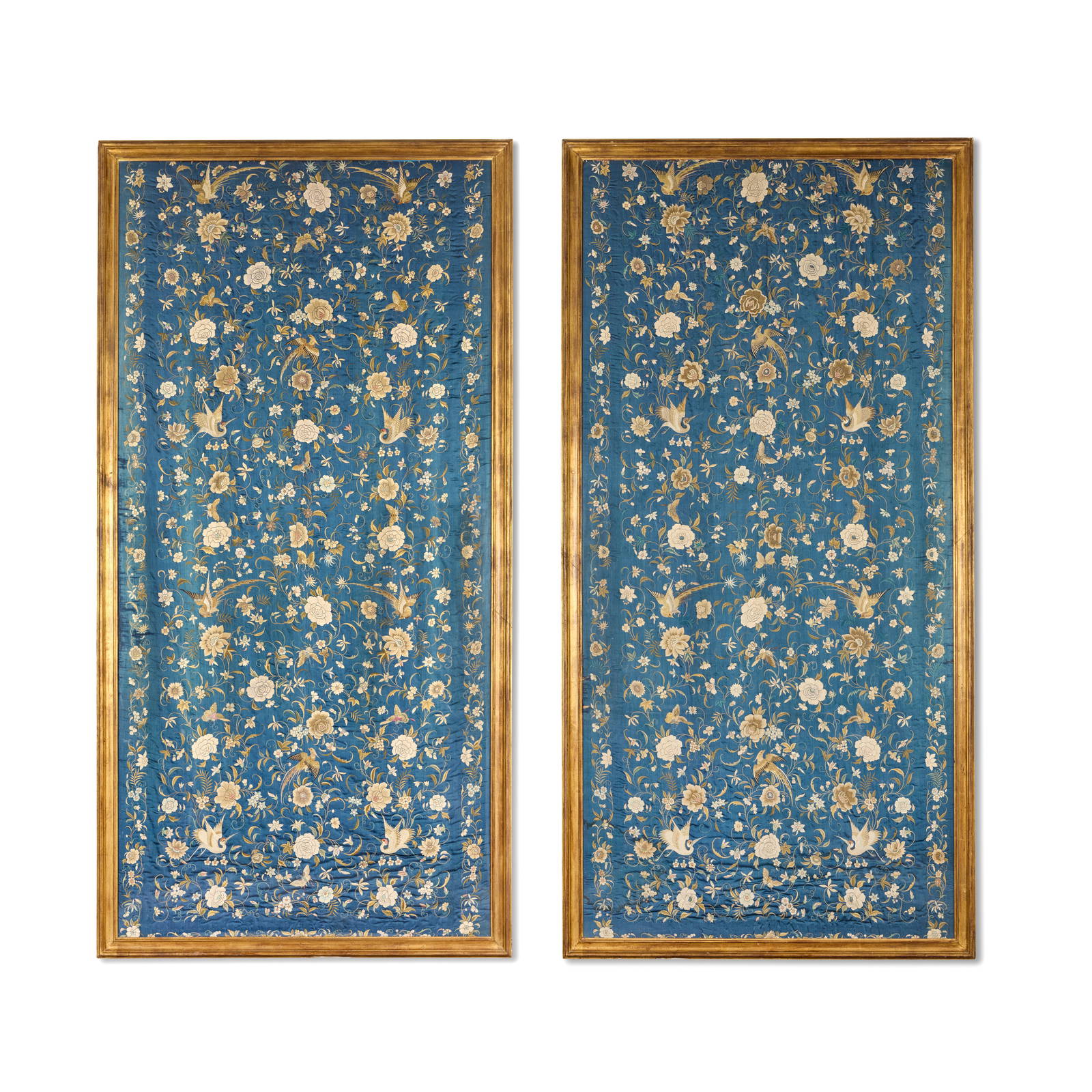 A PAIR OF LARGE EMBROIDERED 'BIRD AND FLOWER' PANELS 19th/20th century (2)