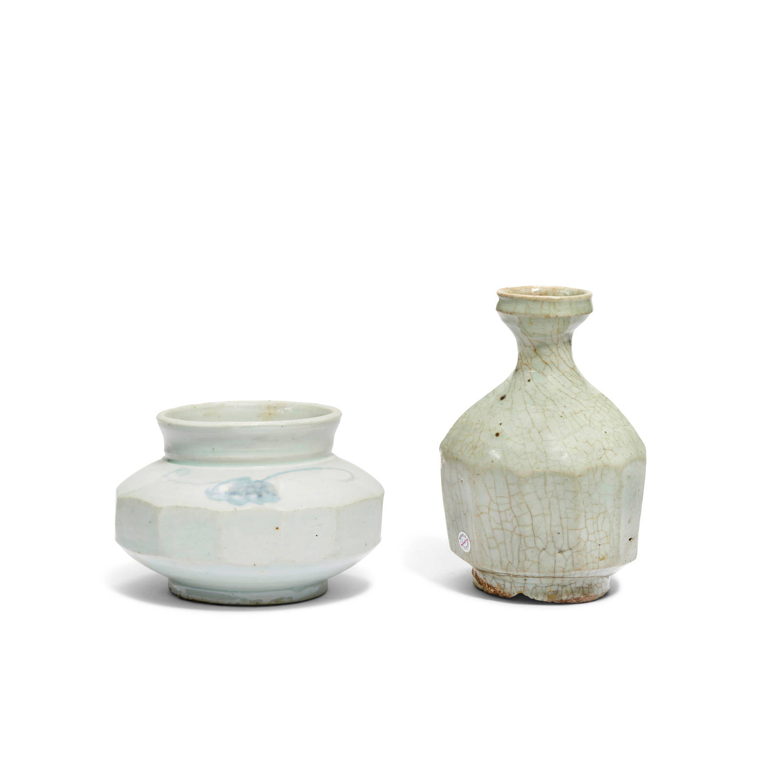 A BLUE AND WHITE FACETED WATER POT AND A PALE CELADON GLAZED FACETED VASE Joseon Dynasty, 18th/1...