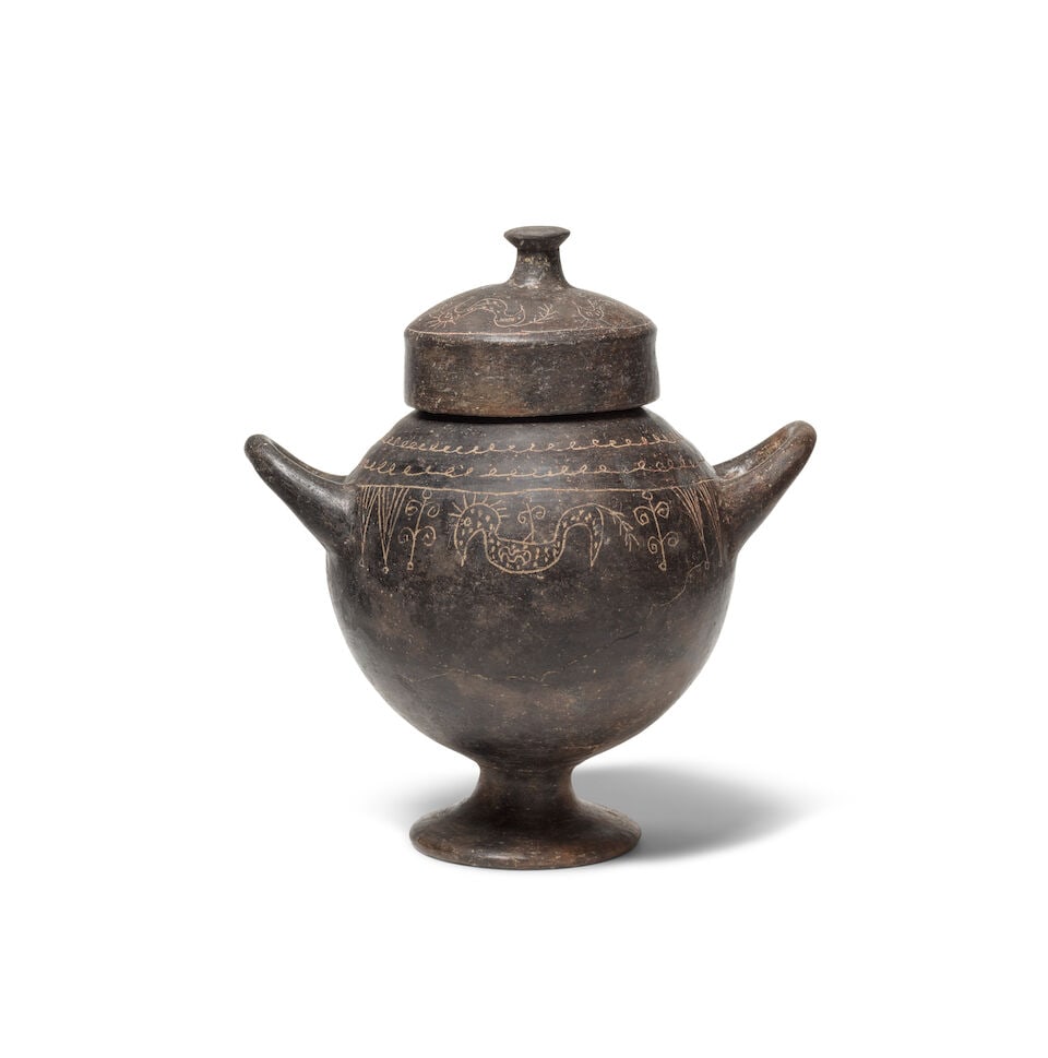 An Etruscan Impasto Ware lidded stamnos engraved with a hippocamp (1 of 2)