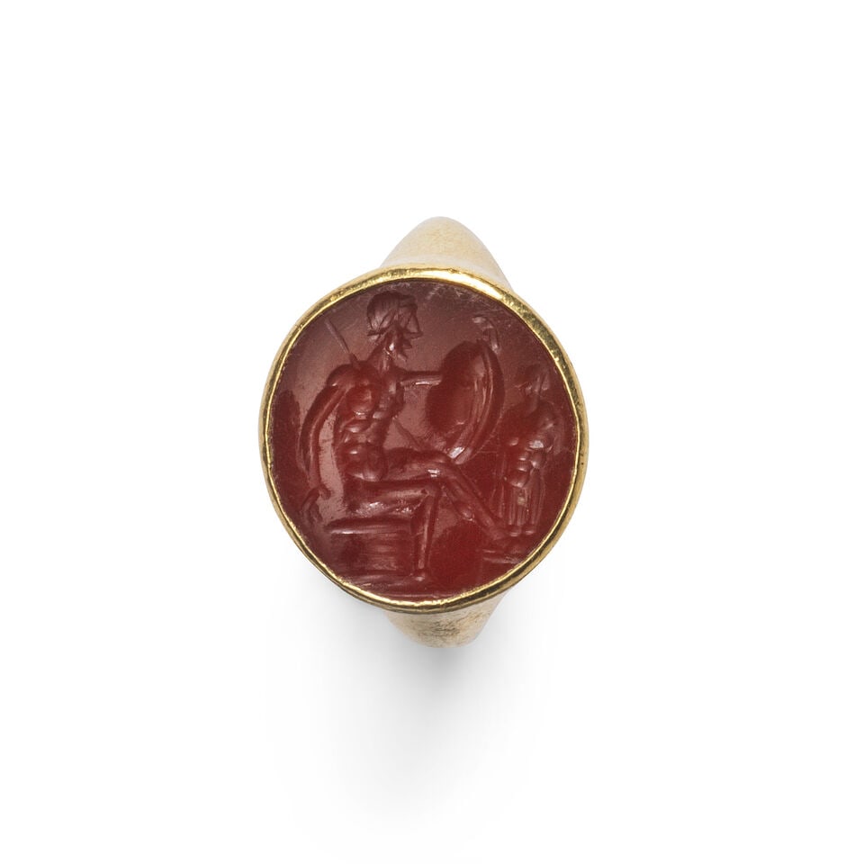 A Roman carnelian intaglio of a warrior and trophy (1 of 2)