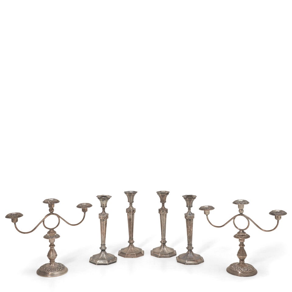 Three Pairs of Sterling Silver Candlesticks,: Three Pairs of Sterling Silver Candlesticks, includes two matching pairs, octagonal base supporting a faceted stem with swagged ribbons, ht. 10; and a pair of three-light candelabra by S. Kirk & Son,