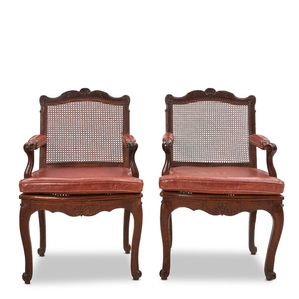 PAIR OF LEATHER UPHOLSTERED CANED OAK ARMCHAIRS, England, 19th century, (1 of 2)