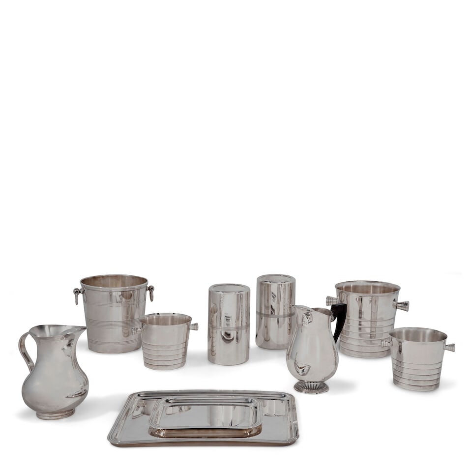 Collection of Christofle Silverplate,: Collection of Christofle Silverplate, includes two 'Folio' ice buckets, ht. 8 1/4; one 'Folio' champagne bucket, ht. 8 1/4; one champagne bucket with incised bands ht. 8 1/4; two wine coolers ht. 9;