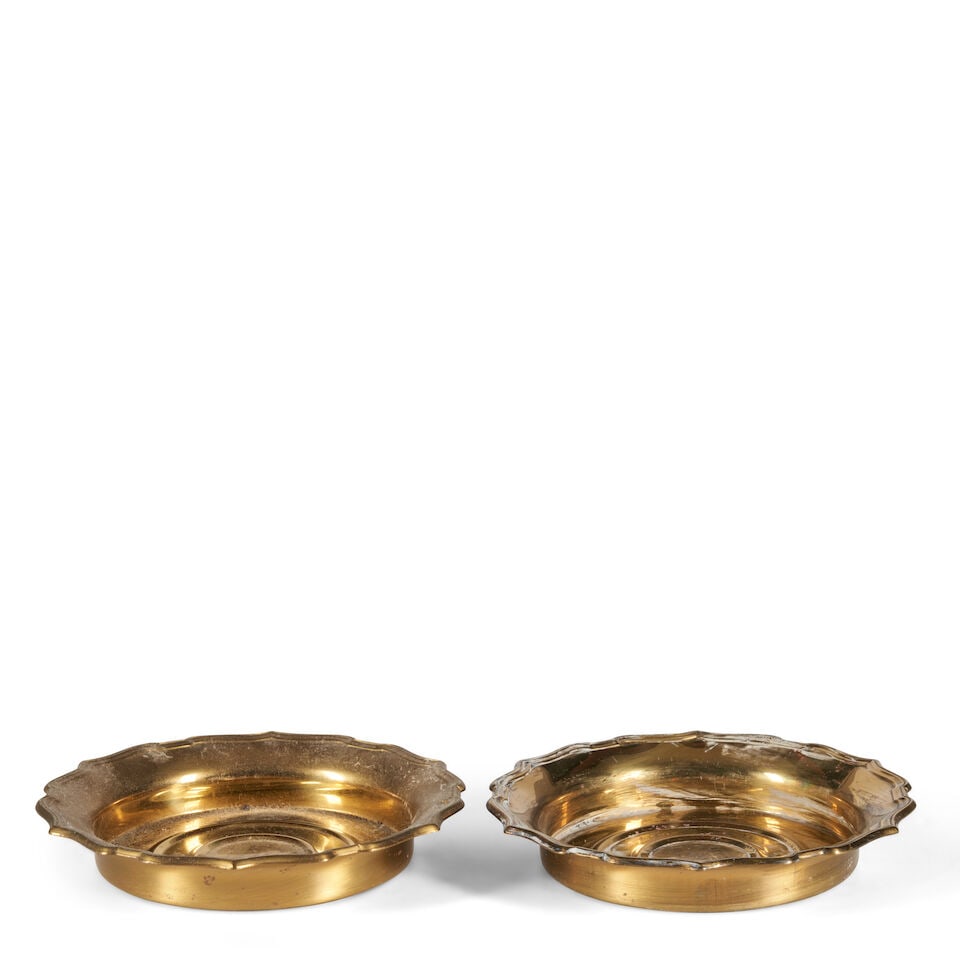 PAIR OF BRASS WINE COASTERS 20th century,: PAIR OF BRASS WINE COASTERS 20th century, each with a scalloped rim, marked 'Seiden Brass' underside, ht. 1 1/8, dia. 6 3/4 in. Footnotes: OVERALL CONDITION: Wear consistent with age and use, includin