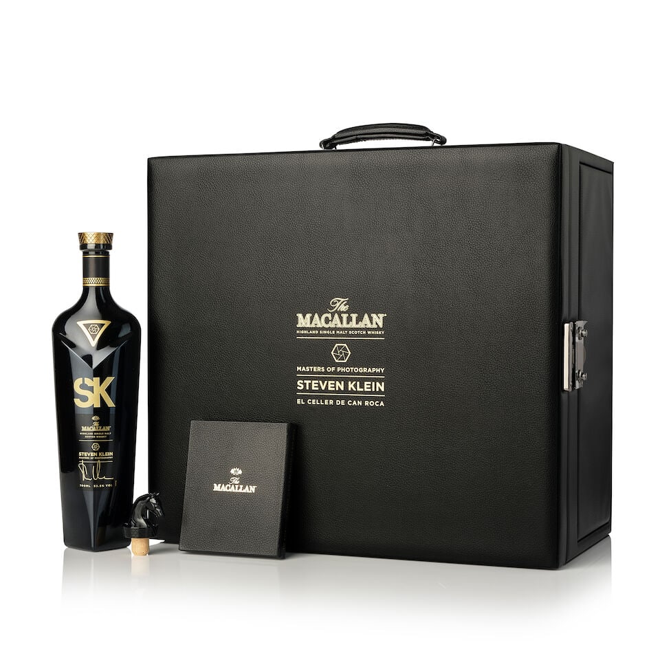 The Macallan Steven Klein Masters Of Photography (1x 700ml): The Macallan Steven Klein Masters Of Photography (1x 700ml) Region: Speyside Fill Level: into neck Label: slightly scuffed neck strip Packaging: in leather suitcase includind six toolkits (the dropper