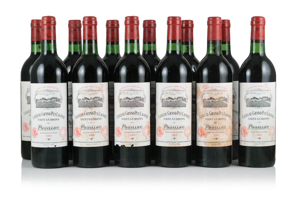 Château Grand Puy Lacoste, 1983 (12 x 750ml): Château Grand Puy Lacoste, 1983 (12 x 750ml) Region: Pauillac Label: bin-soiled, damp-stained & nicked labels - 4 badly, 4 incomplete This lot is subject to the following lot symbols: Δ [