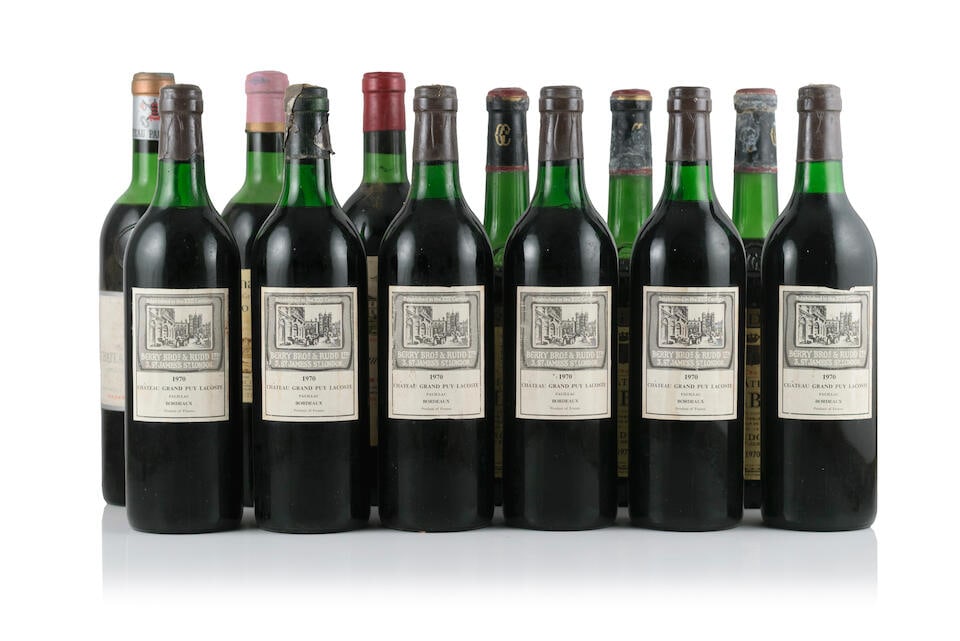 Château Grand Puy Lacoste, 1970 (6 x 750ml) Château Pape-Clément, 1970 (1 x 750m...: Château Grand Puy Lacoste, 1970 (6 x 750ml) Region: Pauillac Fill Level: 2 very top, 3 top, 1 high shoulder Capsule: creased & nicked - 1 torn with cork exposed Label: bin-soiled & damp-stained l