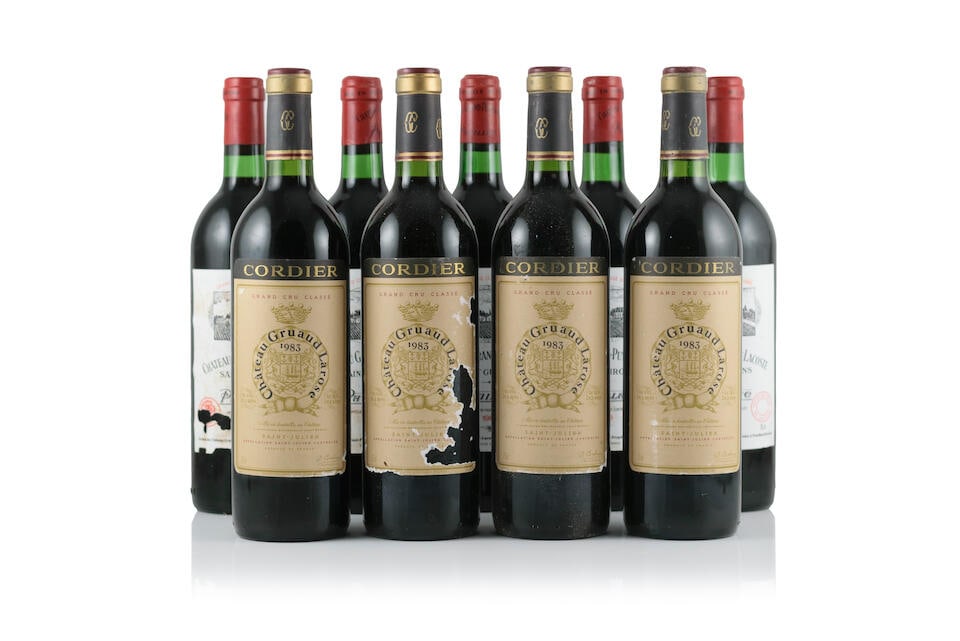 Château Grand Puy Lacoste, 1983 (5 x 750ml) Château Gruaud Larose, 1983 (4 x 750ml): Château Grand Puy Lacoste, 1983 (5 x 750ml) Region: Pauillac Label: bin-soiled & damp-stained labels - 4 creased & nicked, 1 torn & incomplete Château Gruaud Larose, 1983 (4 x 750ml) Region: