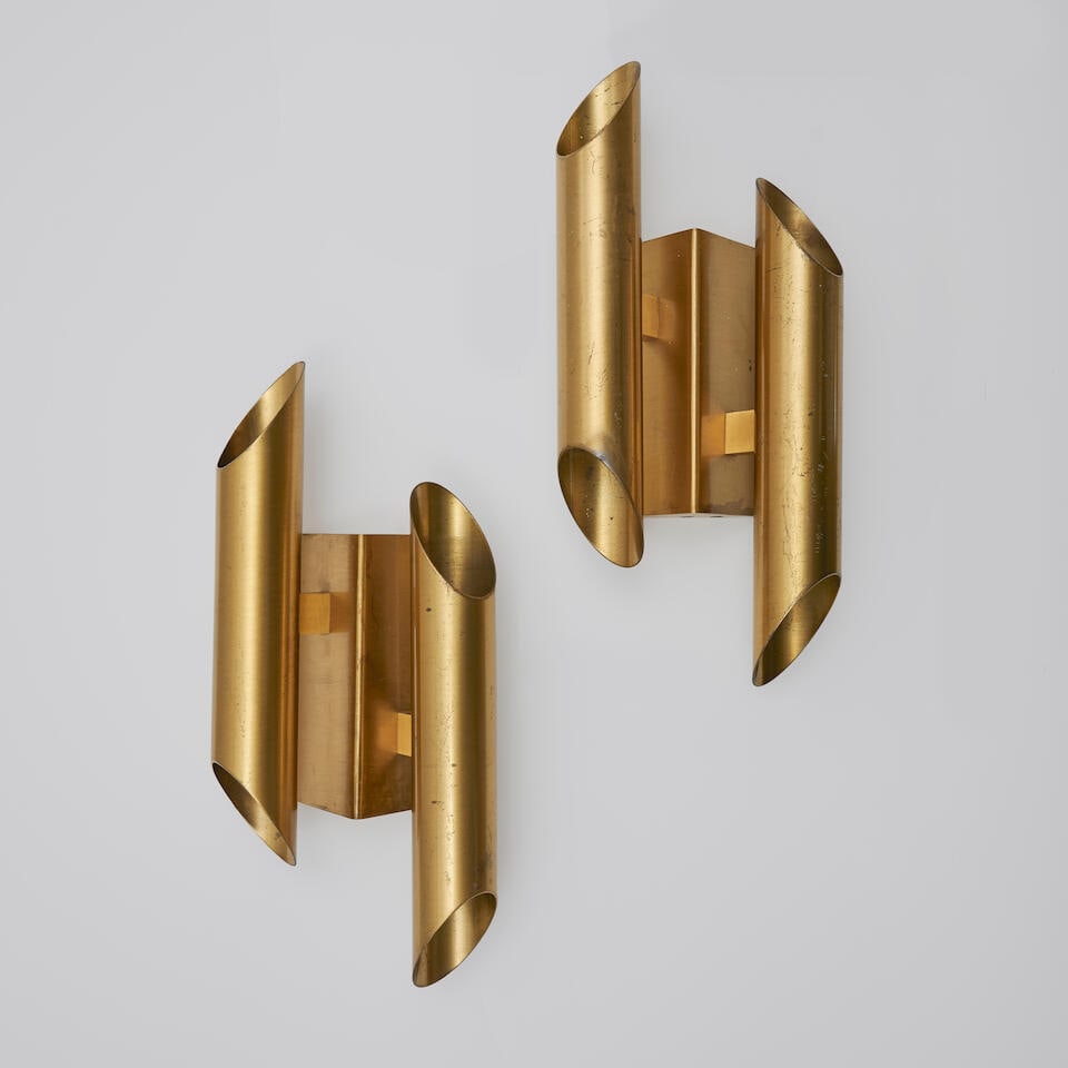 GIANNI CELADA (1935) Appliques de la série Carciofo: GIANNI CELADA (1935) Appliques de la série Carciofo Circa 1970 Acier patiné H: 37 cm. (14.1/2 in.); L: 16,5 cm. (6.1/2 in.); P: 8 cm. (3.1/8 in.) A pair of sconces in patinated steel from th