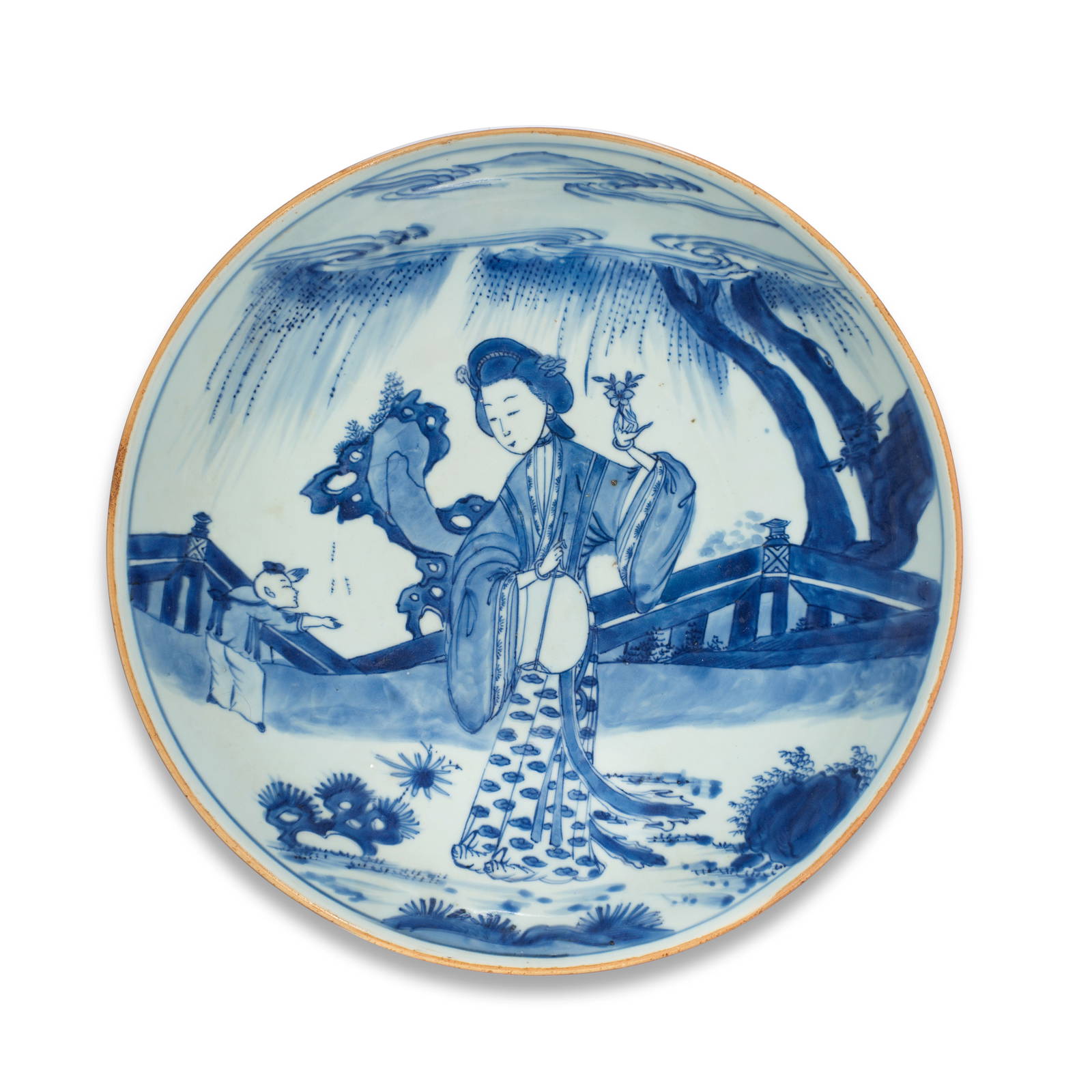 A LARGE BLUE AND WHITE 'LADY AND BOY' SAUCER-DISH Kangxi six-character mark and of the period