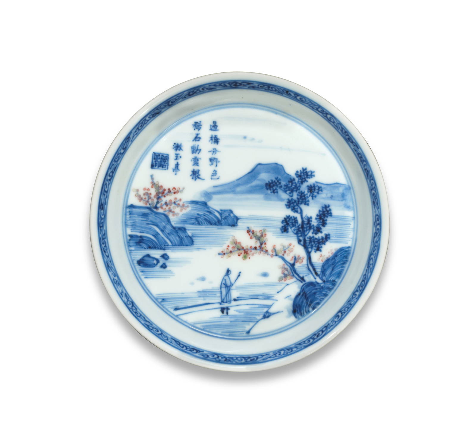 A RARE SMALL BLUE AND WHITE AND COPPER-RED 'LANDSCAPE' DISH Kangxi Zhonghe Tang mark, cyclically...