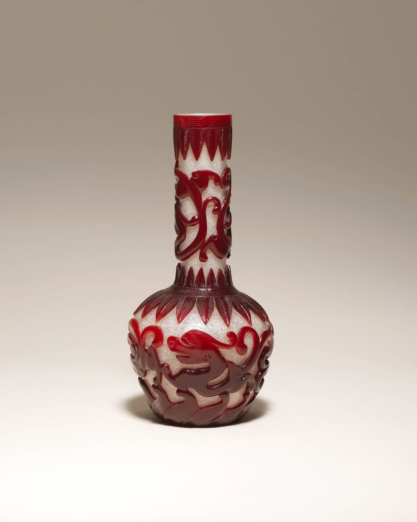 A RUBY-RED GLASS OVERLAY CHILONG-PATTERN BOTTLE VASE 18th/early 19th century