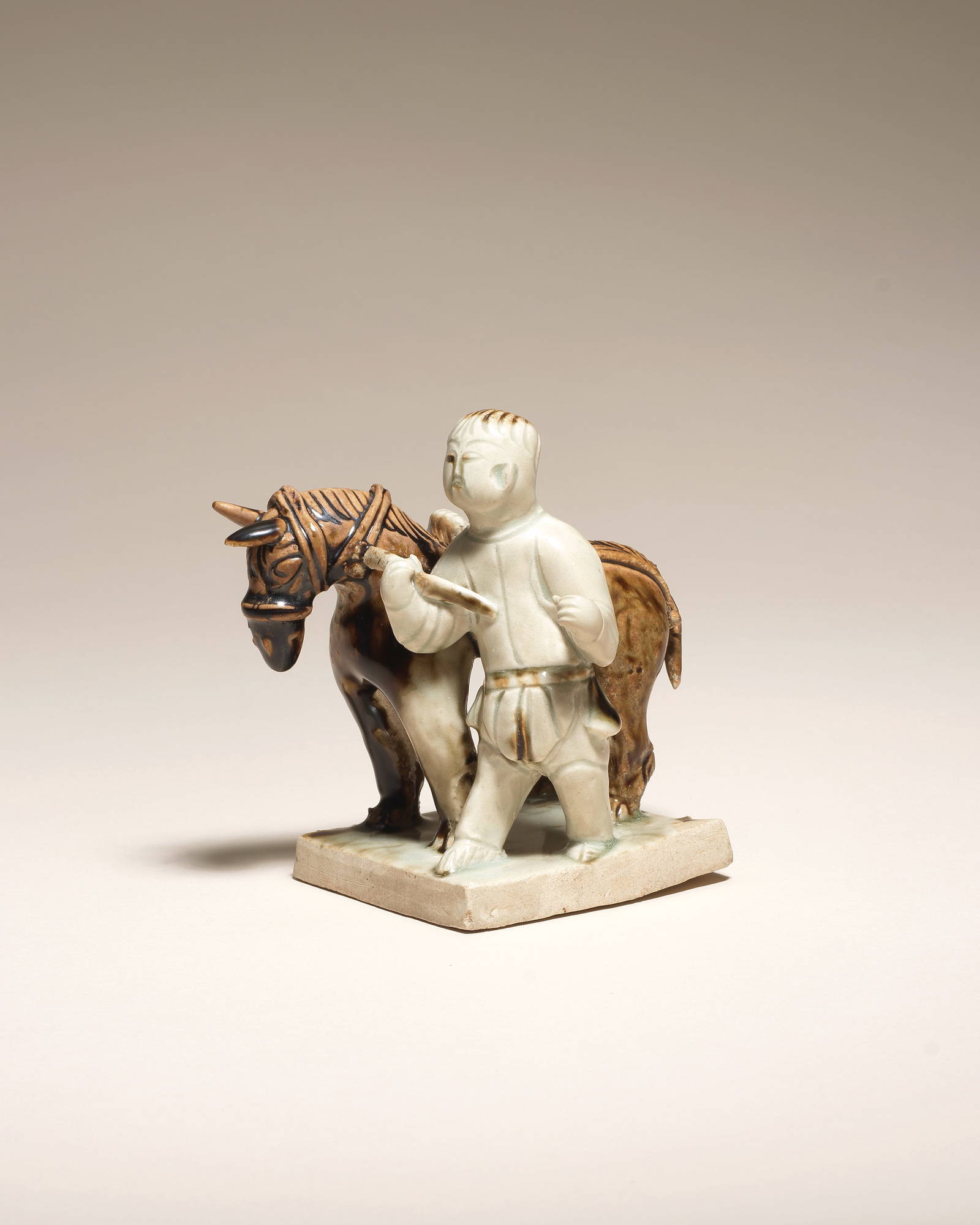 A VERY RARE DINGYAO 'BOY AND A MULE' GROUP Northern Song Dynasty (2)