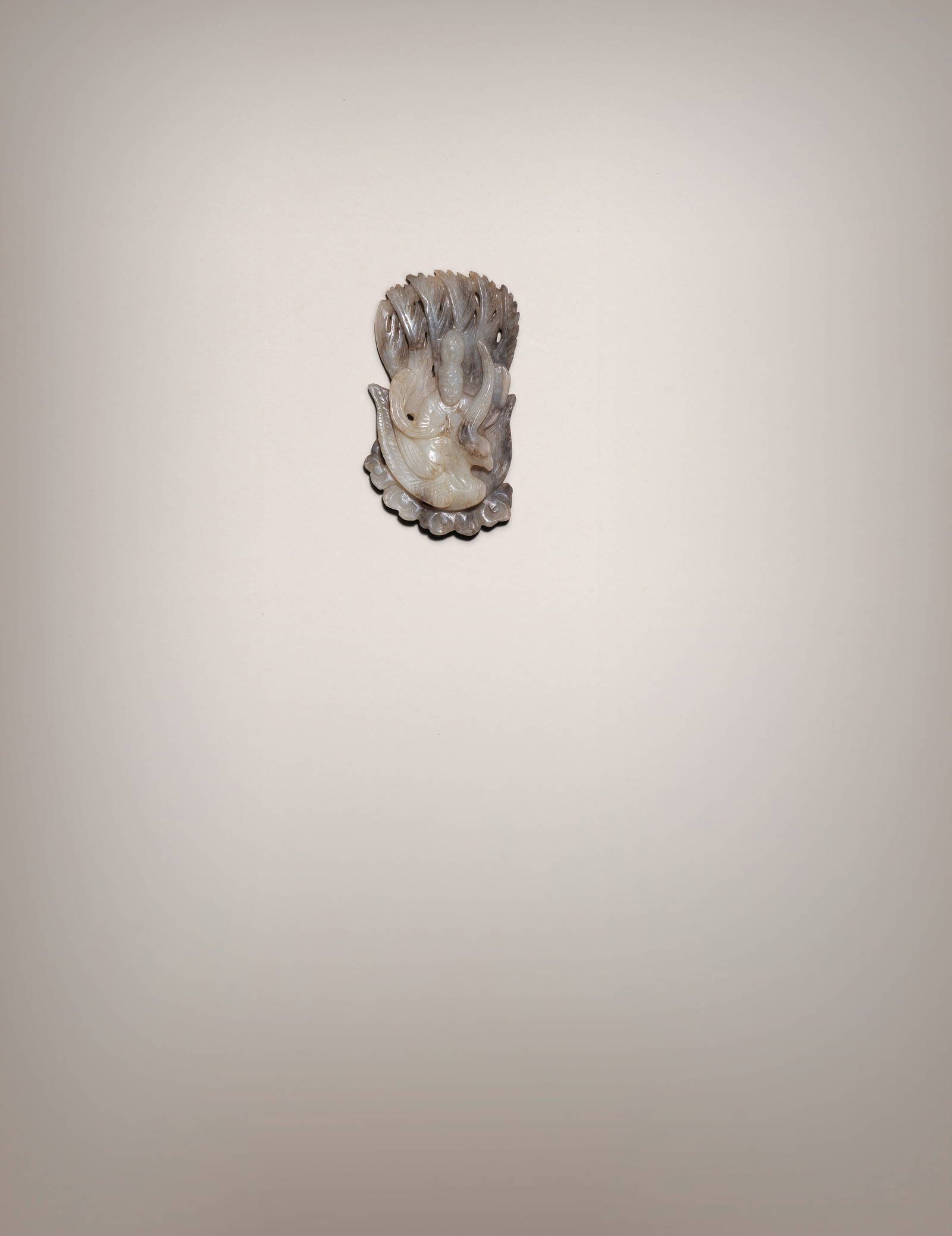 A FINELY CARVED GREY JADE 'NONGYU AND PHOENIX' PLAQUE Song Dynasty