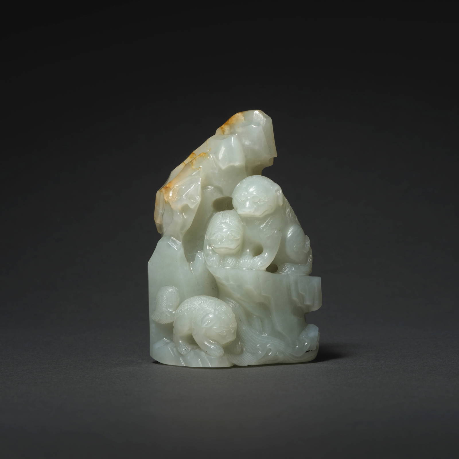 A FINE WHITE JADE 'BUDDHIST LIONS' CARVING Qianlong